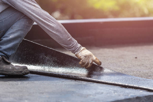 Professional Waterproofing technician working in Pavilion, NY